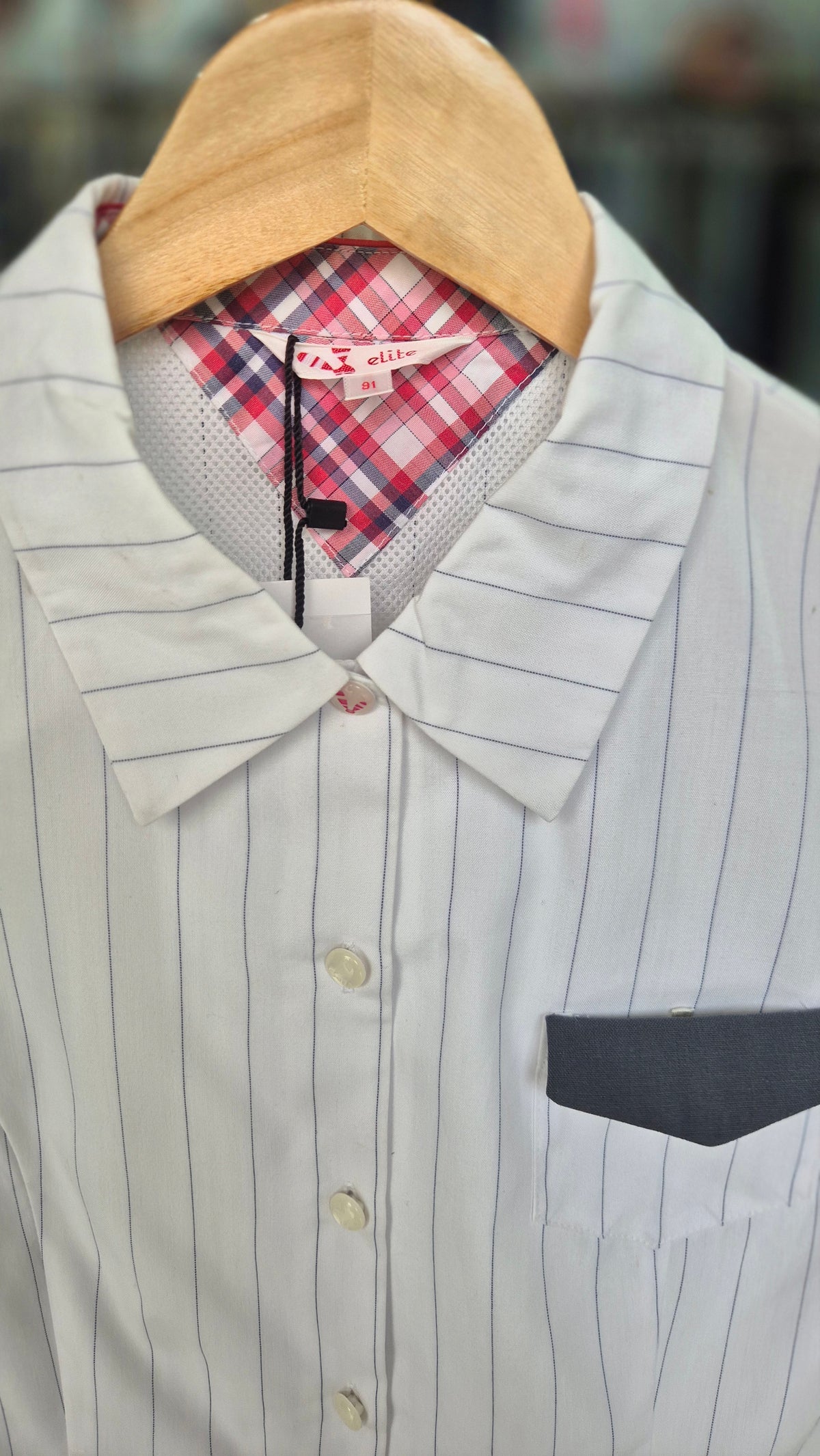 Tailored Pinstripe Shirt with Contrast Pocket and Plaid Accents