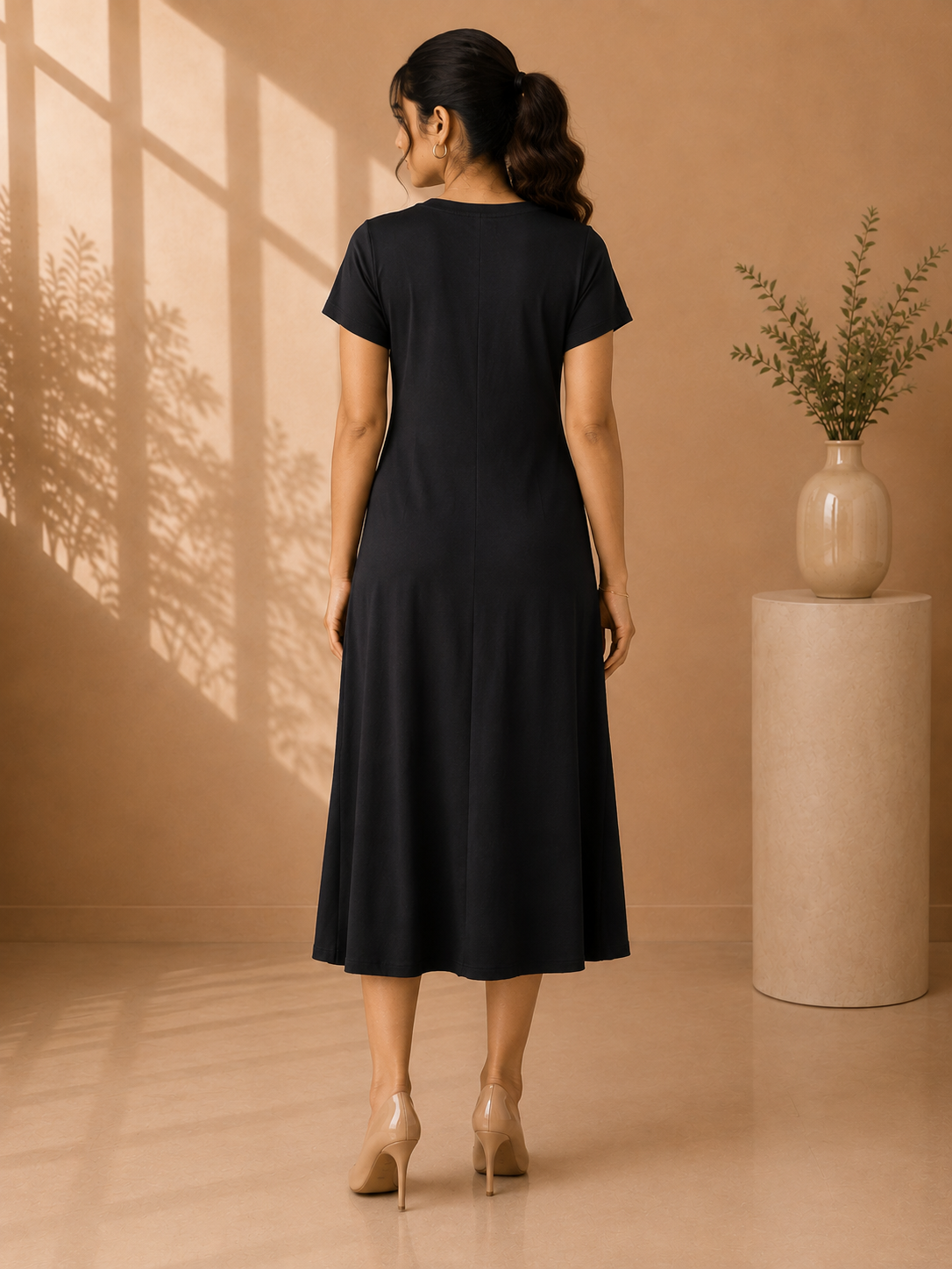 Elegant Black Knot-Front Midi Dress with Slit